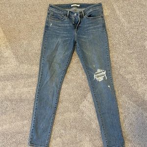 Levi’s 711 Mid Rise Distressed Skinny jeans